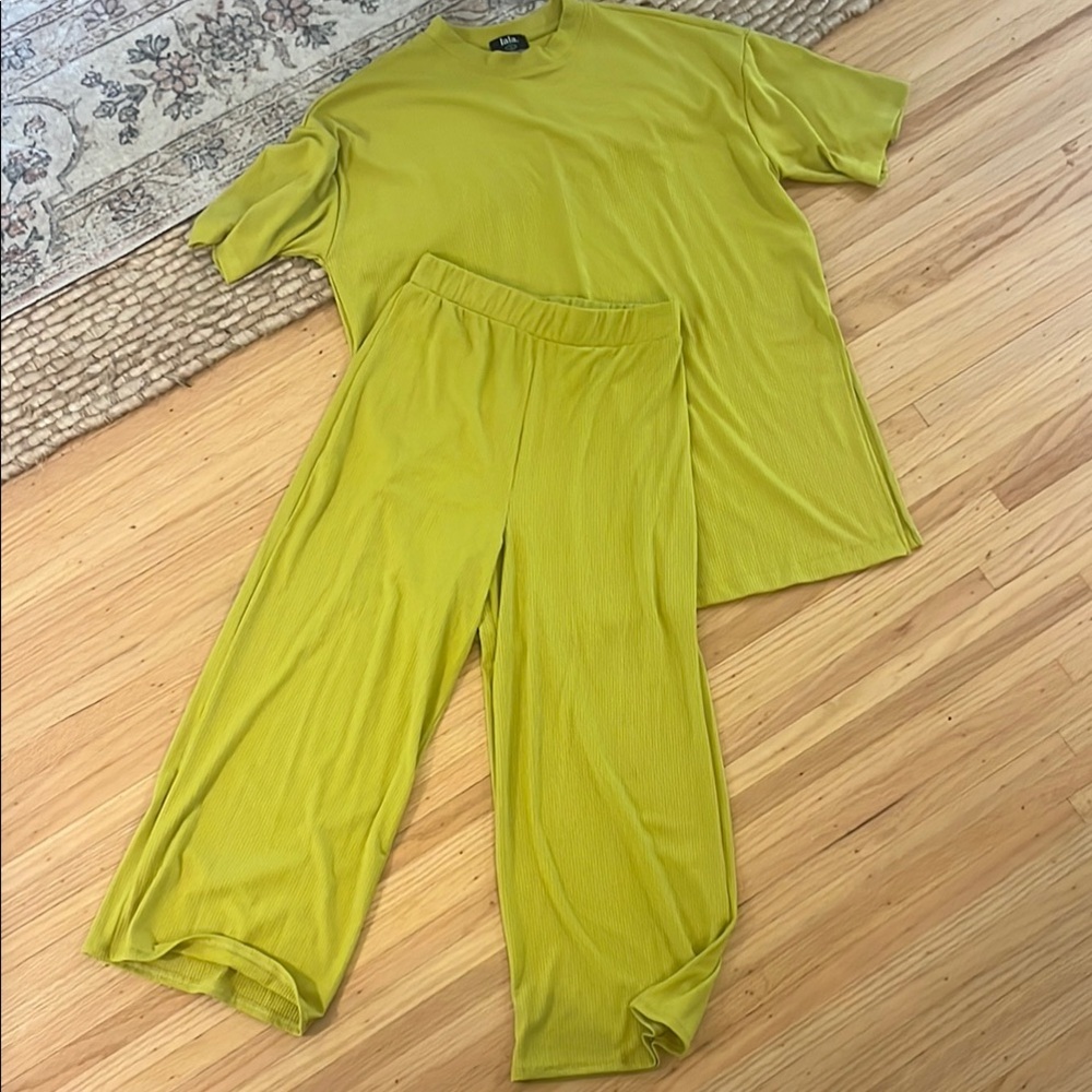 Dressed in LALA Lex Ribbed Playsuit in Chartreuse